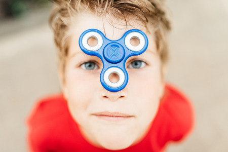The boy looks through spinerの写真素材