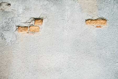 Old wall with a part without plaster.の写真素材
