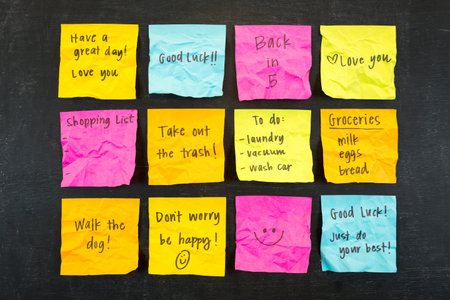 Crumpled hand written sticky note messages