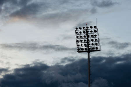 silhouette pillar spotlight on a sunset and Rain clouds are formedの写真素材