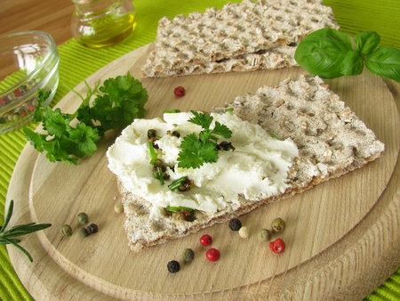 Goat cream cheese on crispbreadの写真素材
