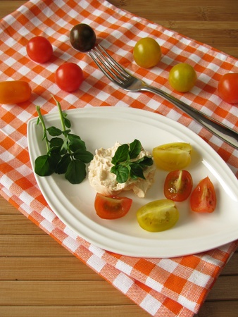 Cream cheese with tomatoes and watercressの写真素材