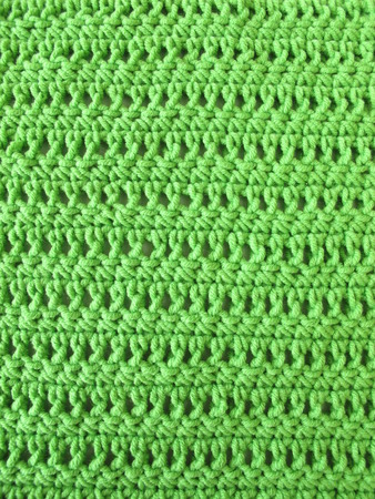 Crochet pattern from single and double crochet stitch in limegreenの写真素材