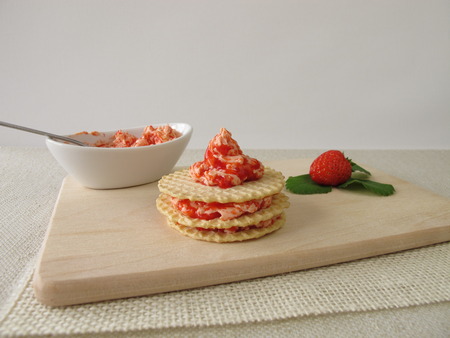 Waffles with strawberry buttercreamの写真素材