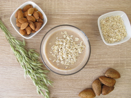 Homemade low carb protein shake with almond flour and rolled oatsの写真素材