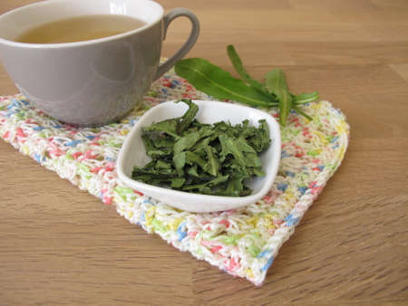 Homemade dandelion tea, tea with dried dandelion herbの写真素材