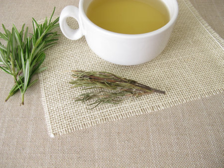 A cup of tea from dried rosemary herbsの写真素材