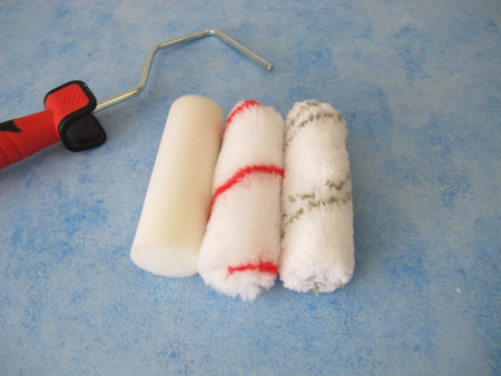 Different paint roller with foam rubber, microfiber and polyester rollerの写真素材