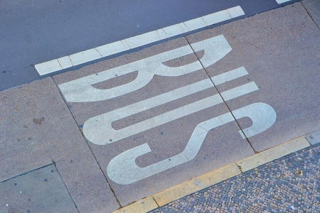 a bus lane on a street in Berlinの写真素材
