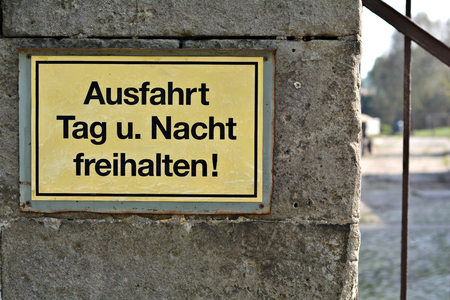 Sign with the words \ &quot;exit day and night keep free \&quot;の写真素材