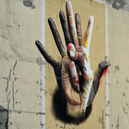 BERLIN, GERMANY - OCTOBER 29, 2014: artwork by German artist Andreas von Chrzanowski on the facade of a house in Berlinのeditorial素材