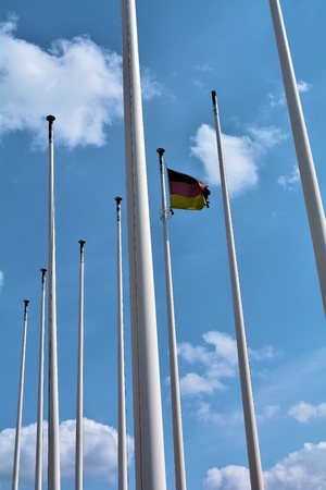 flagpoles with Germany flag in Berlinの写真素材