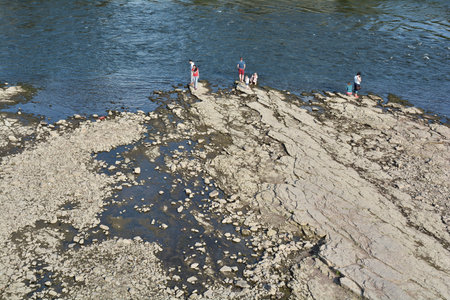 Magdeburg, Germany - August 1, 2015: People in the dry riverbed of the Elbe near Magdeburgのeditorial素材