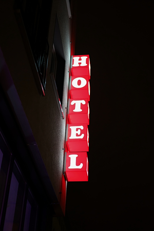 Neon sign of a hotel in the center of Cologneの写真素材