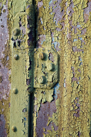 Surface of a rusted old steel door