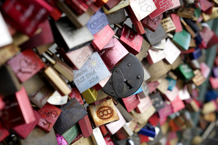 COLOGNE, GERMANY - OCTOBER 21, 2015: Padlocks of loving couples as a sign of loyalty on the Hohenzollern Bridge in Cologneのeditorial素材