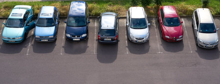 MAGDEBURG, GERMANY - JUNE 14, 2017: Cars on a parking lot in the city center of Magdeburg. Due to the increasing traffic in the city center is difficult to find a parking lot.のeditorial素材
