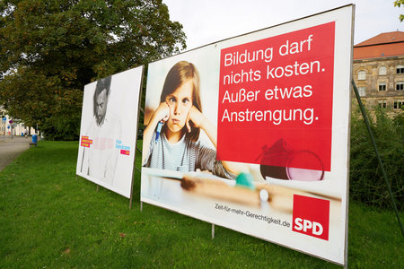 MAGDEBURG, GERMANY - AUGUST 18, 2017: Election campaign posters of different parties, for the...