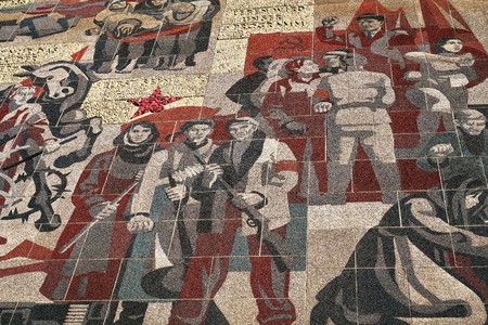 DRESDEN, GERMANY - OCTOBER 11, 2017: Mural "The way of the red flag" from the year 1969 from colored glass at the culture palace in Dresden. It was designed by a collective of artists under the direction of Gerhard Bondzin.のeditorial素材