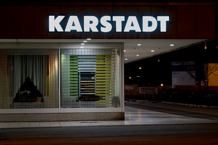 MAGDEBURG, GERMANY - DECEMBER 25, 2017: Exterior view of a Karstadt store in Magdeburg at night. The first Karstadt department store opened in 1881のeditorial素材