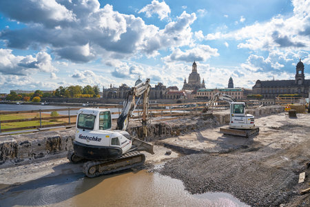 DRESDEN, GERMANY - OCTOBER 12, 2017: Construction vehicles on the Augustus bridge in Dresden during...