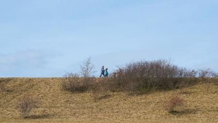 BARLEBEN, GERMANY - MARCH 11, 2018: Walkers on the dike of the Mittelland Canal in Barleben near Magdeburgのeditorial素材
