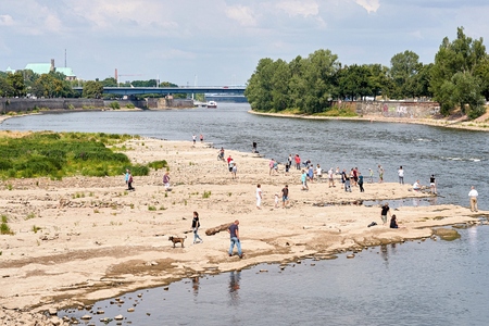 MAGDEBURG, GERMANY - JULY 08, 2018: Strollers on the Cathedral Rock in Magdeburg. The rock is usually located under water and is visible only under heavy droughtのeditorial素材
