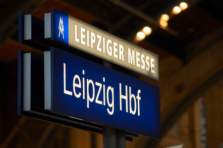 LEIPZIG, GERMANY - OCTOBER 06, 2018: Sign on a platform at Leipzig Central Station with the Leipzig Trade Fair and Leipzig Central Stationのeditorial素材