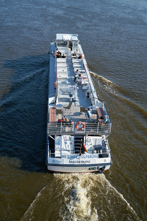 MAGDEBURG, GERMANY - JUNE 15, 2019: Passengers on the motor ship MS Wolfsburg during a trip on the...