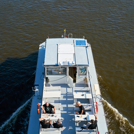 MAGDEBURG, GERMANY - JUNE 15, 2019: Excursion boat with passengers on the river Elbe near Magdeburg