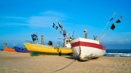 Fishing boats on the beach of the Polish Baltic coast near Rewal