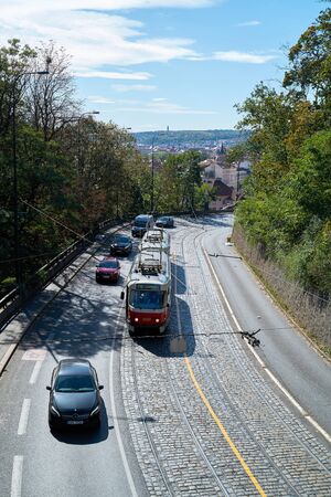 PRAGUE, CZECH REPUBLIC - OCTOBER 01, 2019: Road traffic with cars and tram at Chotek Park (Chotkovy sady) in Pragueのeditorial素材