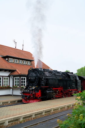 WERNIGERODE, GERMANY - MAY 23, 2020: Locomotive and carriages of the Brockenbahn in the Westerntor station in Wernigerodeのeditorial素材