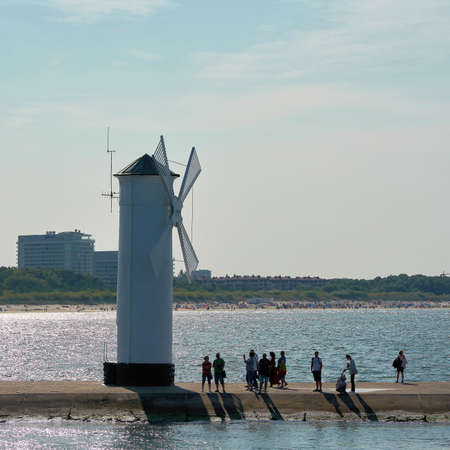 SWINOUJSCIE, POLAND - SEPTEMBER 12, 2020: The windmill fire on the shore of the Baltic Sea coast, the symbol of the town of Swinoujscieのeditorial素材