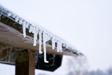 Icicles on a roof in a cold winter