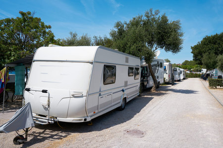 Mobile homes on a popular campsite on the island of Krk near the town of the same name Krk in Croatiaの写真素材