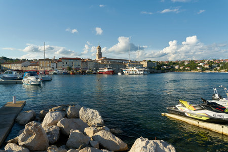 Krk, Croatia - August 05, 2021: View over the harbor to the old town of Krk on the island of the same name in the Adriatic Sea in Croatiaのeditorial素材