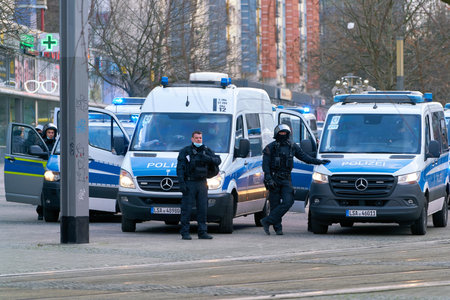 Magdeburg, Germany â€“ January 08, 2022: Police security forces during protests by opponents of...