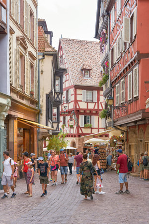 Colmar, France â August 31, 2022: Tourists from all over the world in the picturesque medieval old town of Colmar in Franceのeditorial素材