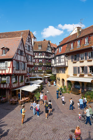 Colmar, France â August 31, 2022: Tourists from all over the world in the picturesque medieval old town of Colmar in Franceのeditorial素材
