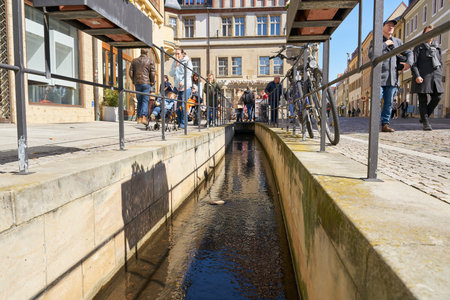 Wittenberg, Germany - April 16, 2022: the Trajuhnsche Bach, Trajuhn's brook in the old town of Lutherstadt Wittenbergのeditorial素材