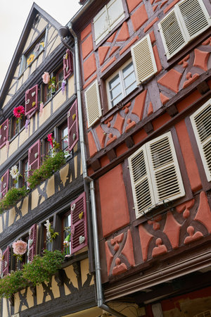 Facades of historic half-timbered houses in the old town of Colmar in Franceの写真素材