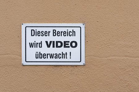 Sign with the german inscription this area is under video surveillance, this area is under video surveillanceの写真素材
