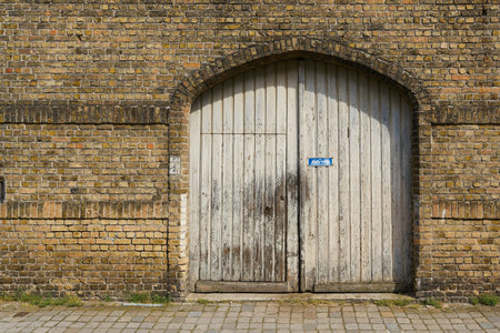 old shabby garage door in the old town of Bruges in Belgium