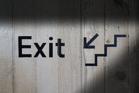 Lettering with the word Exit, indicating an exit in a public buildingの写真素材