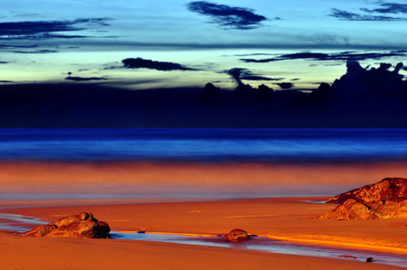 beach at sunset in Phuket, Thailandの写真素材