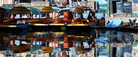 Colourful Mexican gondolas at Xochimilco's Floating Gardens in Mexico City, Xochimilcoの写真素材