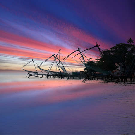 Chinese Fishing Nets at sunset in Cochin, Kerala, Indiaの写真素材