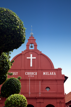 Christ Church on Red Square at Melaka city center under a blue sky, Malaysiaの写真素材