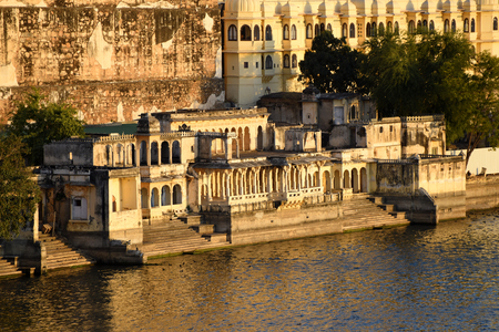 Udaipur cityscape, the historical lakeside architecture at lake Pichola, Rajasthan, Indiaの写真素材